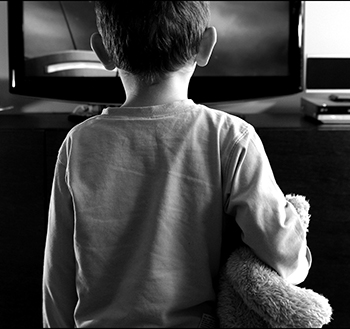 Child with stuffed animal